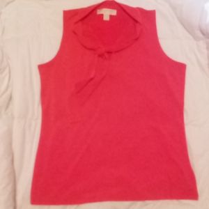 Sleeveless Michael Kors top.